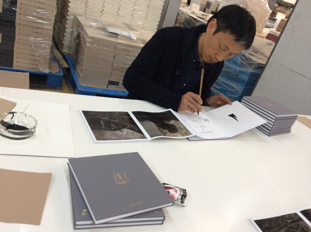 The Chinese artist Wei Bi signs …